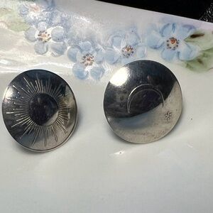 Round Native American Earrings with Sun and Moon et
Symbols, unmarked pre-owned.